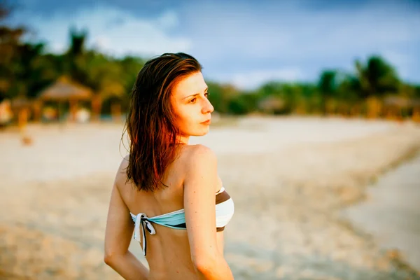 Skinny Russian girl posing on the beach paradise