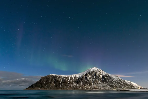 Aurora borealis over Skagsanden beach on Lofoten Islands