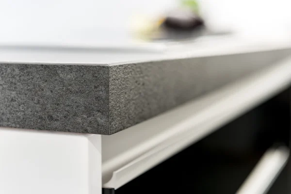 A detail of a stylish kitchen counter