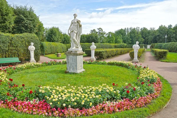 Ancient statues in the flower garden in Gatchina