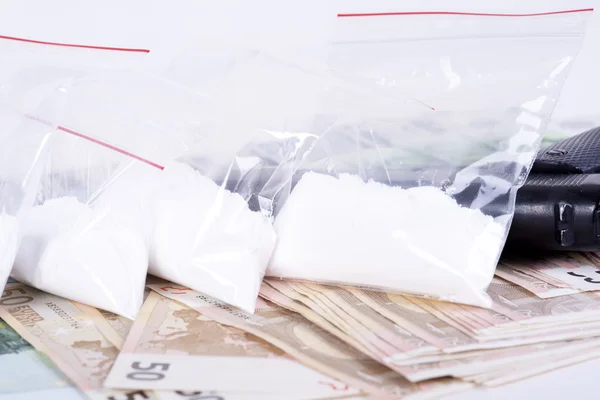 Drugs,money,cocaine and gun
