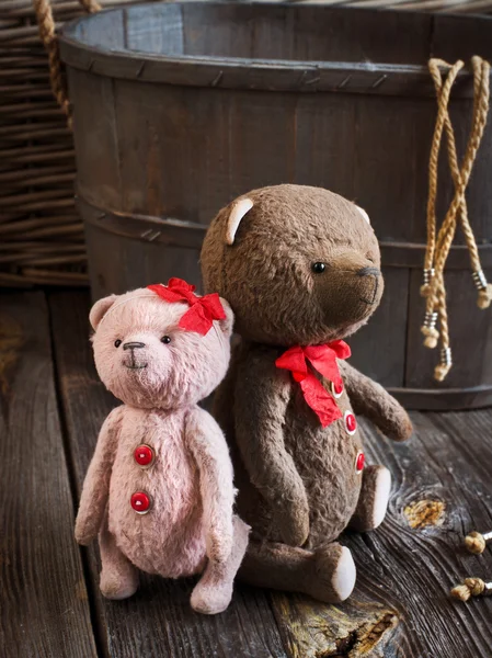 Teddy bears couple holding hands