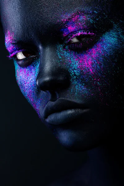 Black woman face with neon make-up