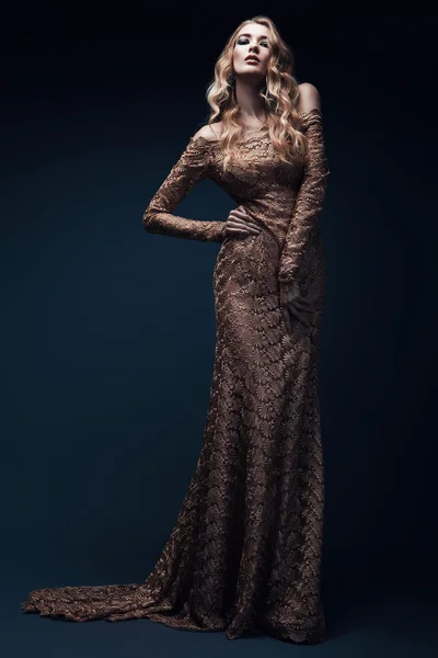 Woman in gold dress