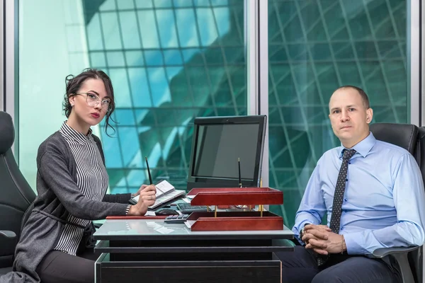 Business team standing in office .