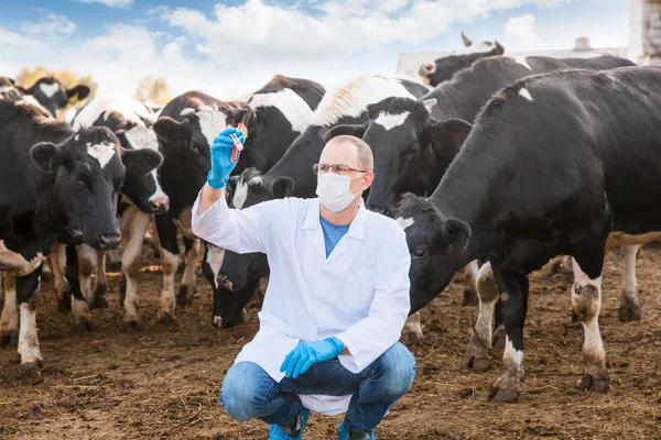 Farmer checks  biological samples