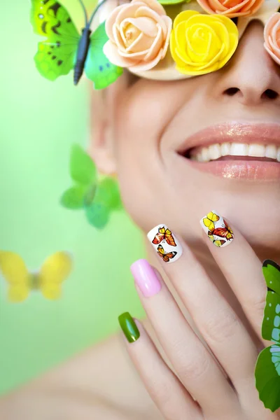 Manicure with butterflies.