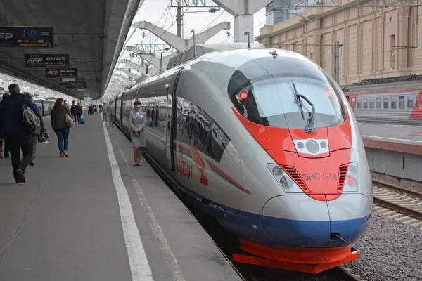 Passengers boarding the train sapsan at the Saint-Petersburg