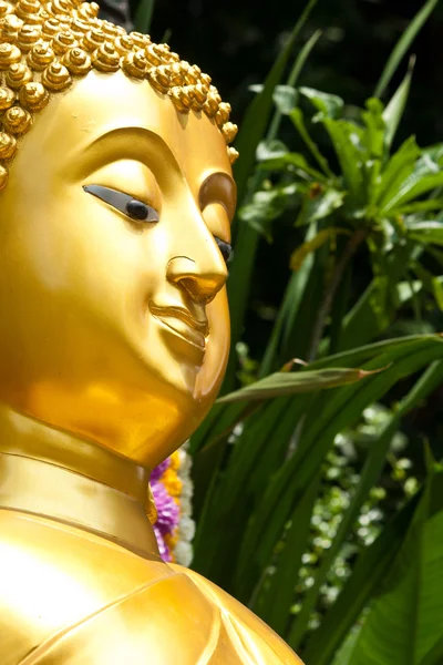 Golden Buddhist statue face