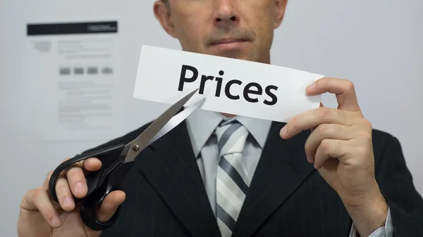 Businessman Cuts Prices Concept