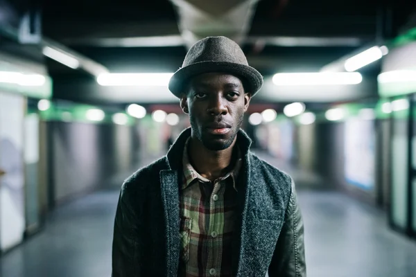 Afro black man in a underground station