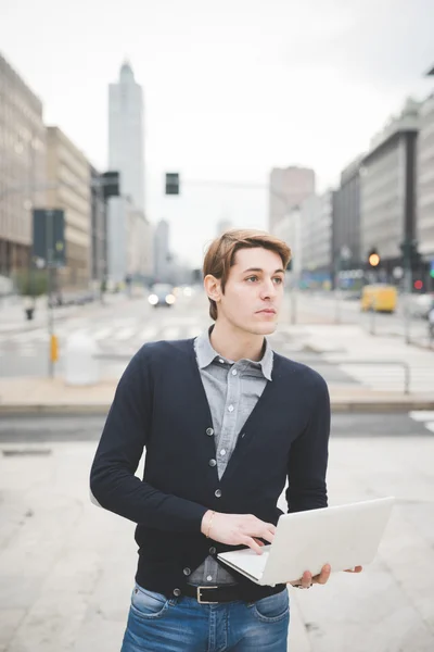 Businessman standing on the street