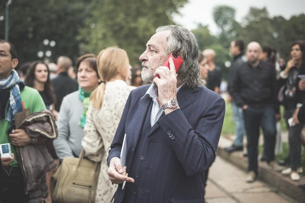 Eccentric and fashionable people during Milan fashion week 2014