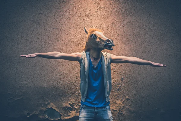 Horse mask young hipster gay man
