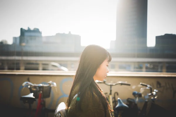 Young beautiful asian hipster woman