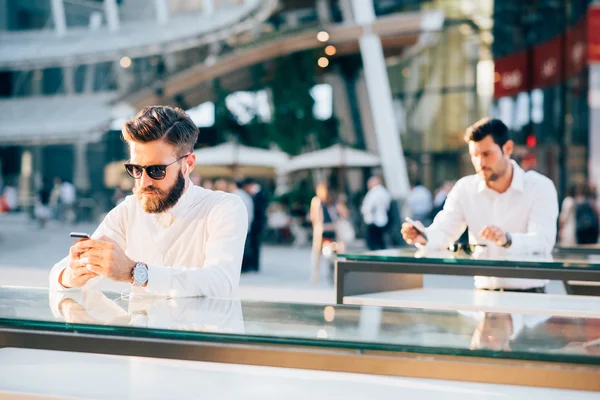 Handsome businessmen using smartphone