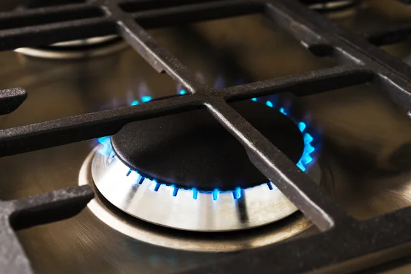 Burning blue gas on the stove