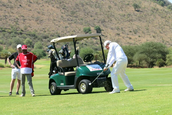 Tournament presenter and grand master Gary Player playing the pe