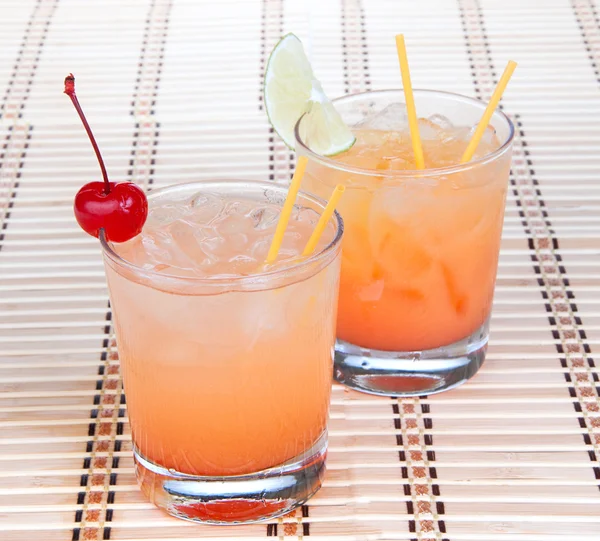Alcohol margarita cocktails or long island Iced tea with lime in