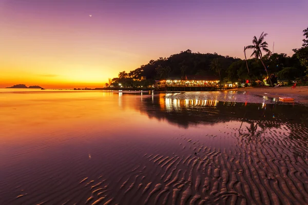 Romantic Evening on a tropical island with night illumination. T