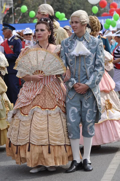 Chelyabinsk,Russia - September 3,2011: carnival procession of people in clothing of the 18th century in honor of the city of Chelyabinsk on the main street of the city