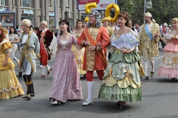 Chelyabinsk,Russia - September 3,2011: carnival procession of people in clothing of the 18th century in honor of the city of Chelyabinsk on the main street of the city