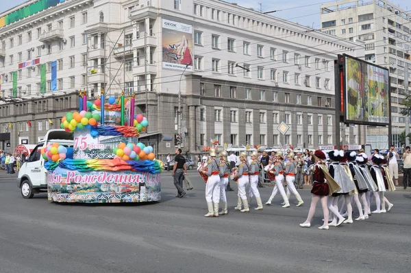 CHELYABINSK,RUSSIA - SEPTEMBER 3,2011: carnival procession of people in honor of the city of Chelyabinsk on the main street of the city