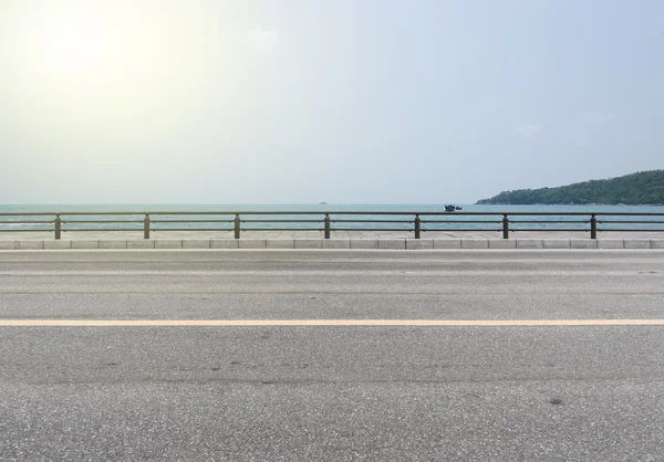 Road side view on sea background.