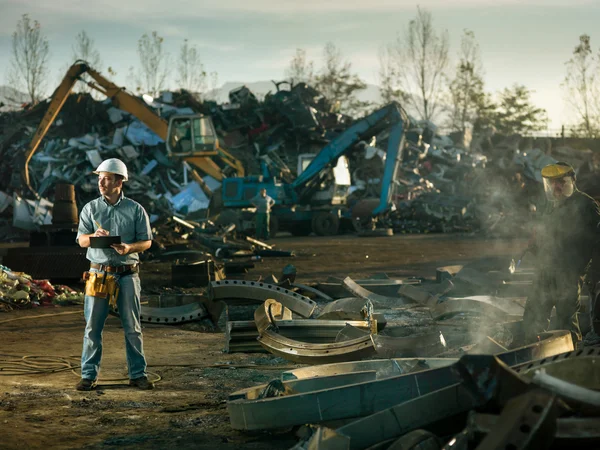 Men at work in recycling center