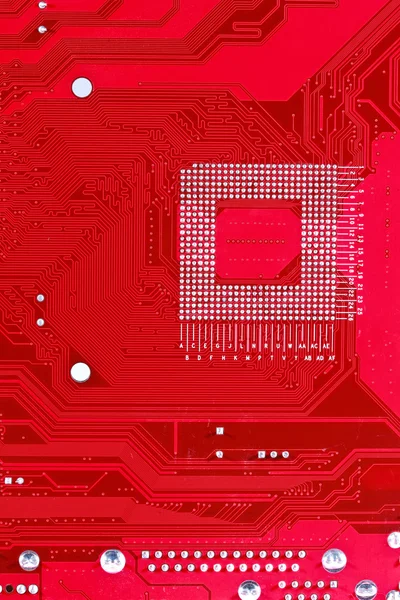 Red circuit board texture background of computer motherboard