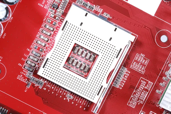 Close-up of electronic circuit red board with processor of compu