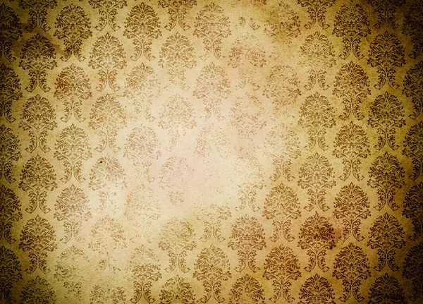 Old grunge paper background with old-fashioned patterns.