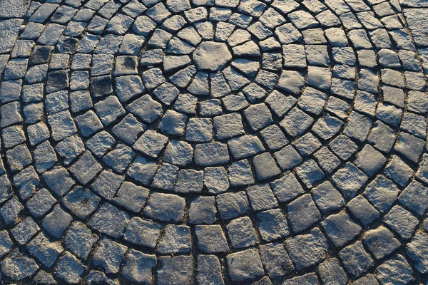 Paver blocks laid in a circular pattern