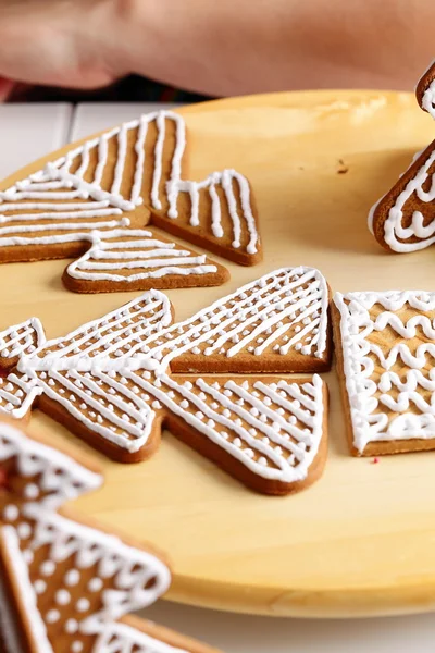 Decorating gingerbread cookies.