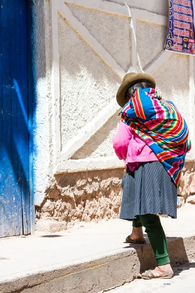 Native woman in Maras Peru