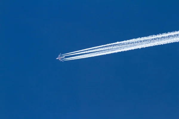 Emirates plane and trail