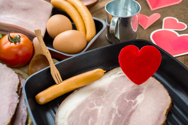 Heart in a frying pan for Love or Heart Healthy Cooking Concept