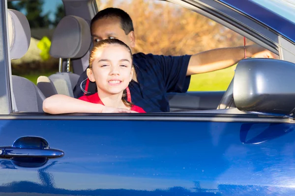 Multi-Race Girl Enjoys Time In Passengers Seat