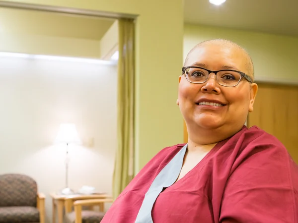 Female Wears Gown Awaiting Medical Care