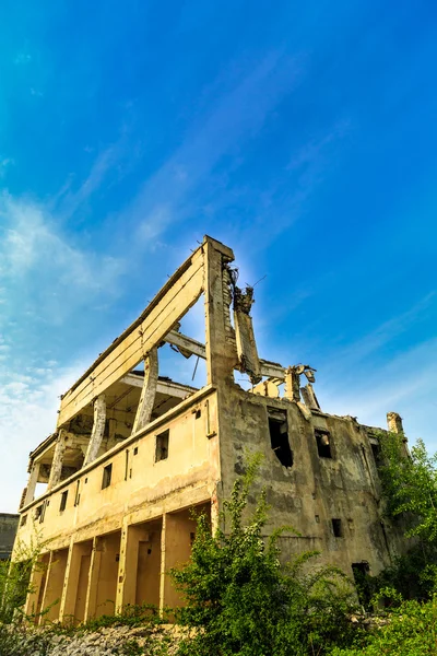 Demolished buildings, industrial ruins, earthquake