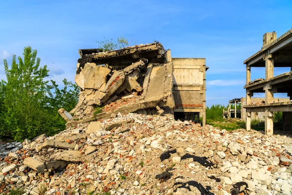Demolished buildings, industrial ruins, earthquake