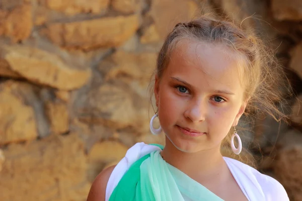 Little girl holding a Greek amphora