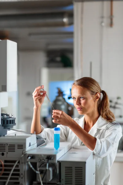 Portrait of a female researcher doing research in a lab