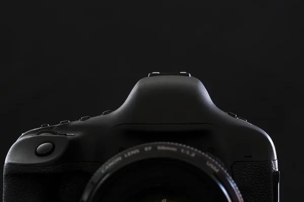 Professional modern DSLR camera low key stock photo/image - Mode