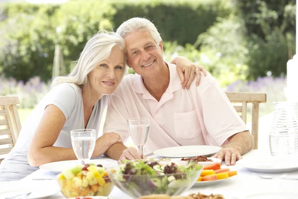 Senior couple enjoying al fresco meal