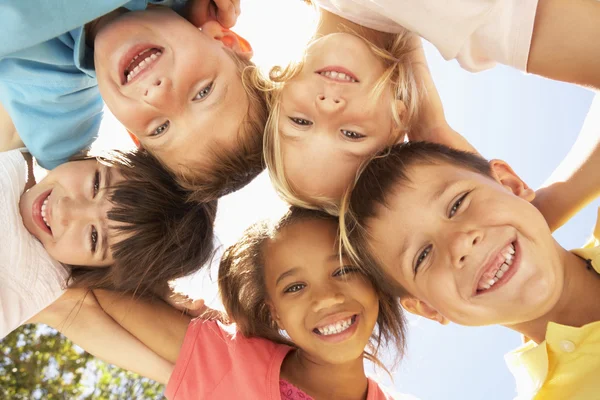 Children Looking Down Into Camera