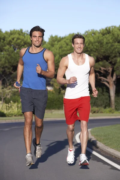 Men Running On Road