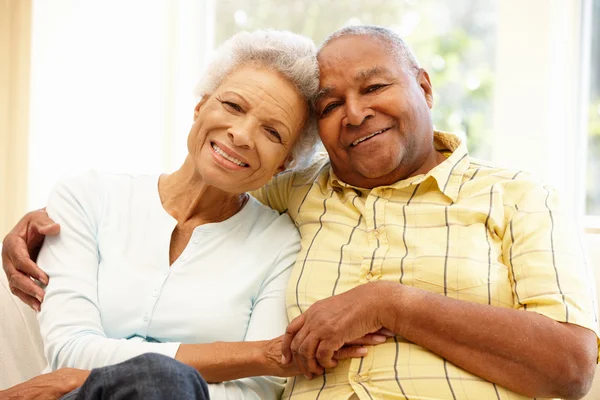 Senior couple relaxing at home