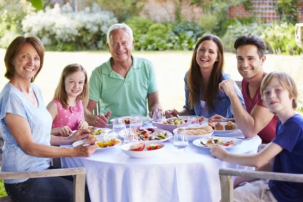 Family Enjoying Meal Together