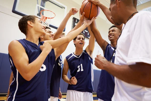 Basketball Team Having Talk With Coach